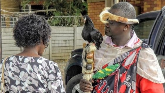 Traditional healer Kuppe Banda, who said he uses a dove to expose cheating couples. Photo by Raymond Morare 