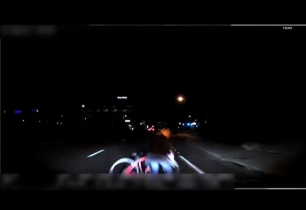 This file of a video grab made from dashcam footage released by the Tempe Police Department on March 21, 2018 shows the moment before the collision of ride-sharing Uber's self-driving vehicle and a pedestrian in the city of Tempe, Arizona on March 18, 2018. HO / Tempe Police Department / AFP