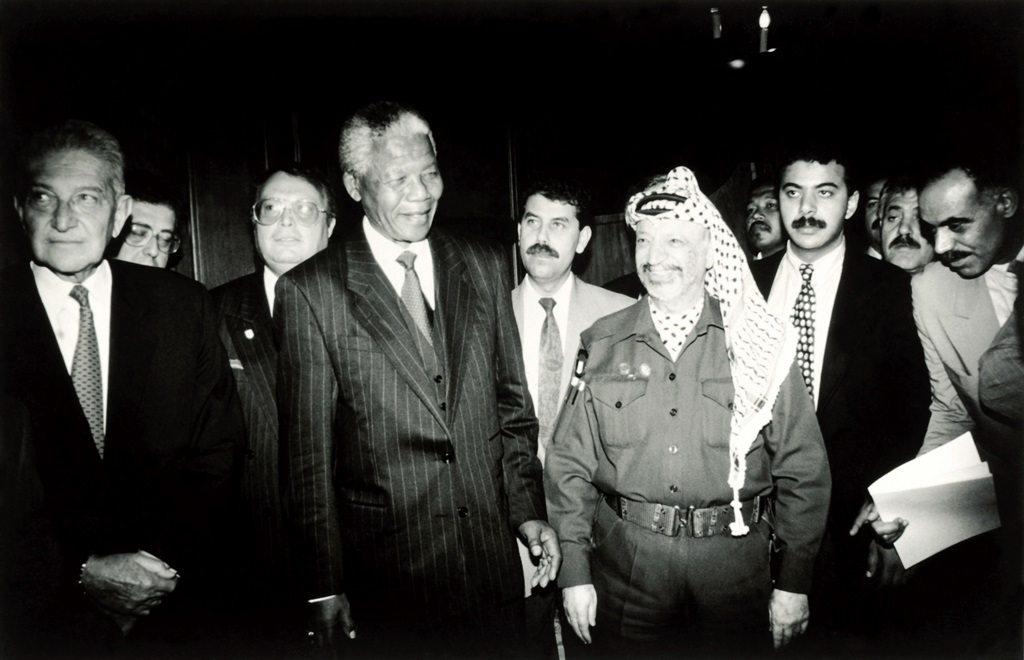 President Nelson Mandela, who was officially inaugurated on 10 May 1994 at the Union Buildings in Pretoria is seen here with Yasser Arafat, leader of the Palestinian Liberation Organisation and Israeli President Ezer Weizman that evening.  