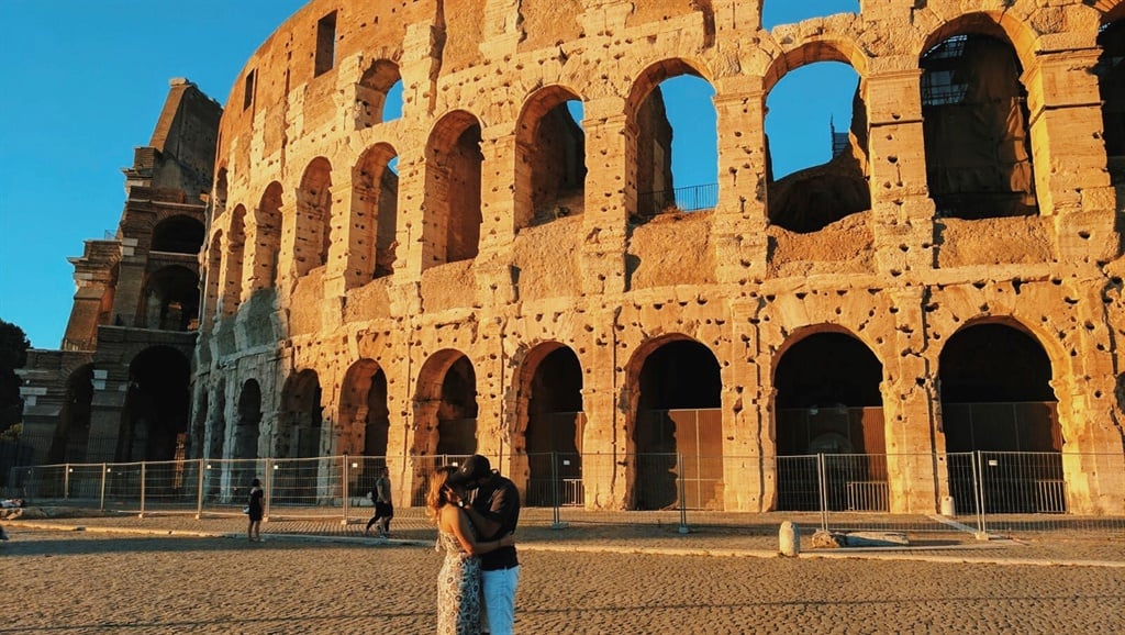 Kristina Kuqi, 23, kisses a stranger in Rome. Image: Mercury Press