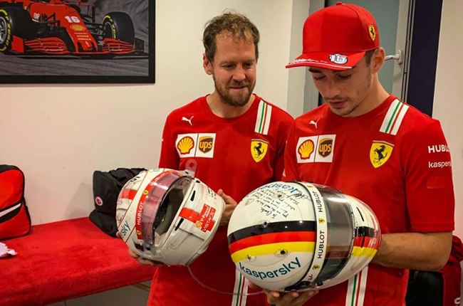 Charles Leclerc (right) and Sebastian Vettel