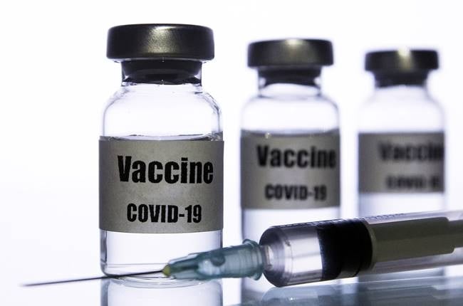 More than one hundred fifty COVID-19 coronavirus vaccines are in development across the world (Photo illustration by STR/NurPhoto via Getty Images)