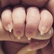 People are freaking out after a mom posted this picture of her newborn’s hand showing off a ‘baby manicure’