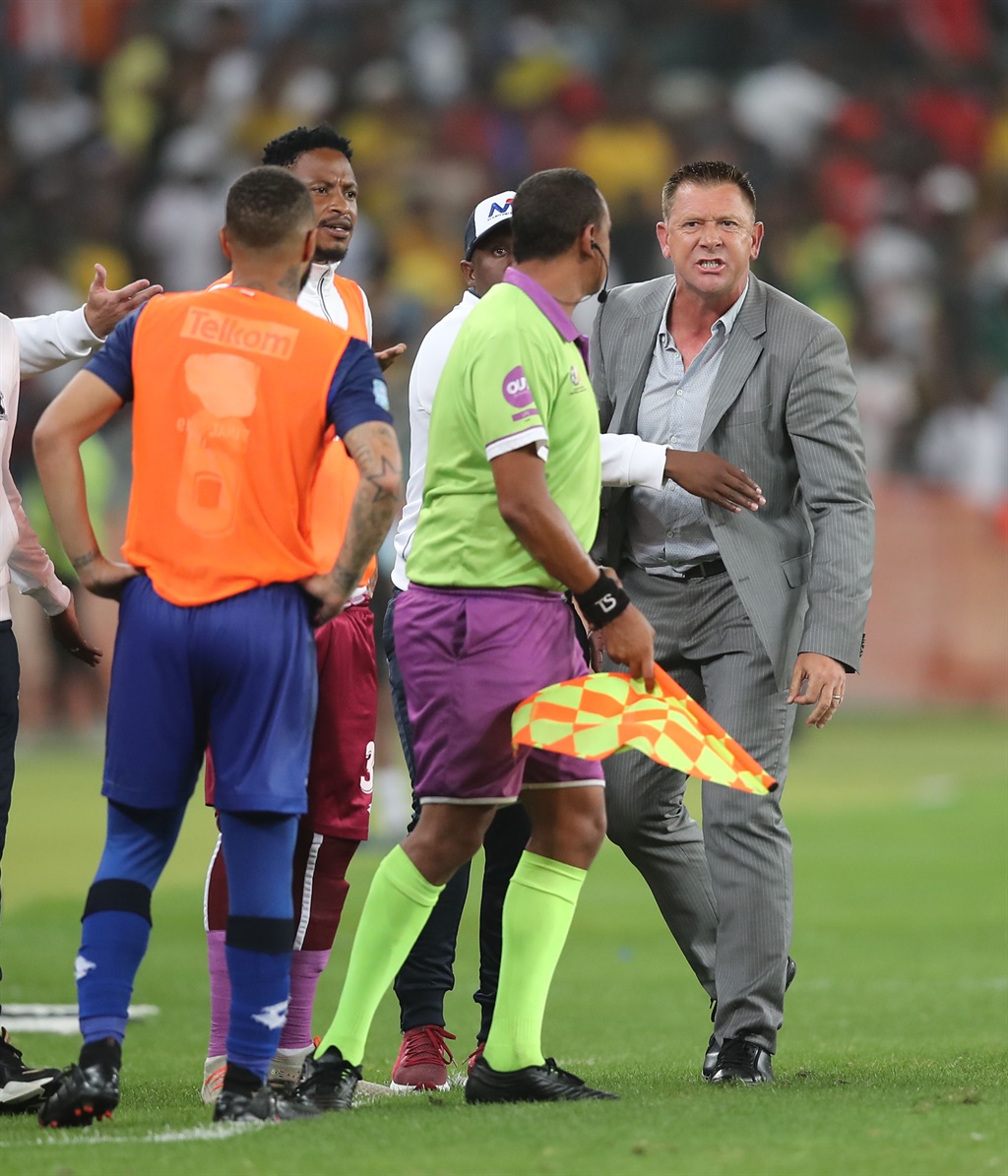 Eric Tinkler, coach of Maritzburg United agues with the assistant referee during the 2019 Telkom Knockout final match between Maritzburg United and Mamelodi Sundowns at Moses Mabhida Stadium Durban, on 14 December 2019