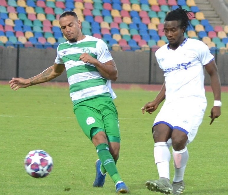 Bloemfontein Celtic’s Ryan De Jongh tackling Rivers United’s Fortune Omoniwari in their first leg match at the Petrus Molemela Stadium.