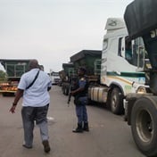 Truck and taxi 'war' leaves motorist stranded  