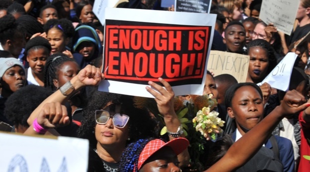 Protesters gather to hand-over a memorandum of grievances during gender-based violence demonstration outside Parliament, following the rape and murder of UCT student Uyinene Mrwetyana on September 05, 2019 in Cape Town, South Africa. While accepting a memorandum of demands from the protesters, Ramaphosa admitted that he will be addressing the issue of violence against women and children and that a state of emergency should be declared. (Photo by Gallo Images/Ziyaad Douglas)