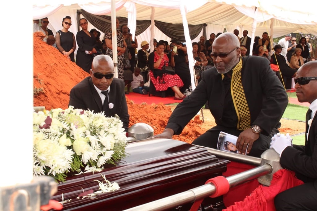 Marc's brother Alex Rantseli talking to his late brother for the last time. Photo by Phuti Mathobela