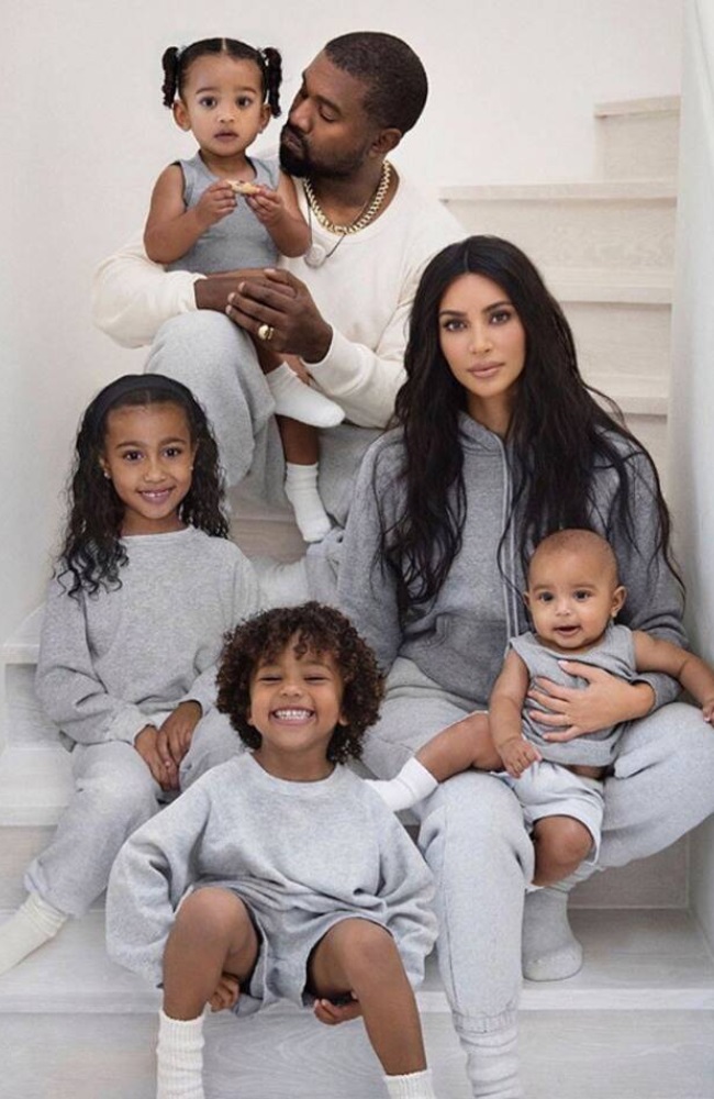 At first glance, Kim and Kanye's family snap seems