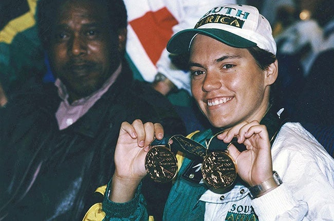 South African swimmer Penny Heyns celebrates with her two Olympic gold medals following the 1996 Atlanta Olympic Games. (Wessel Oosthuizen/Gallo Images)