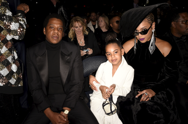 Blue Ivy sits with her parents, Jay-Z and Beyonce, at the At the 2018 Grammys. (Photo: Gallo Images/Getty Images)
