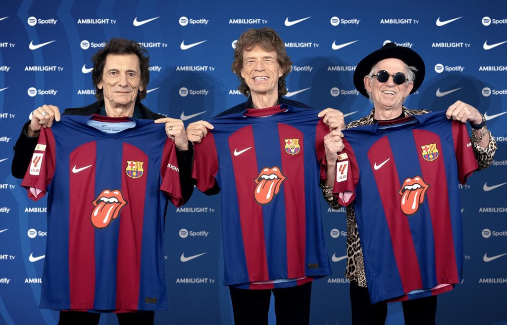 Mick Jagger, Keith Richards and Ronnie Wood of The Rolling Stones showcase the jersey FC Barcelona will wear for ElClásico on 28 October. 