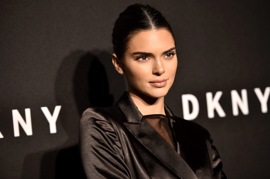 Kendall Jenner attends the DKNY 30th Anniversary party. Photographed by Steven Ferdman 