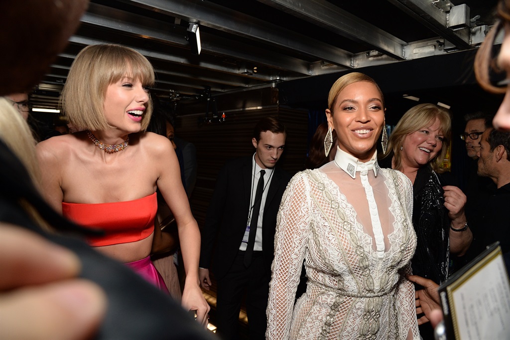 Singers Taylor Swift (L) and Beyonce attend The 58th GRAMMY Awards at Staples Center on February 15, 2016 in Los Angeles, California.  