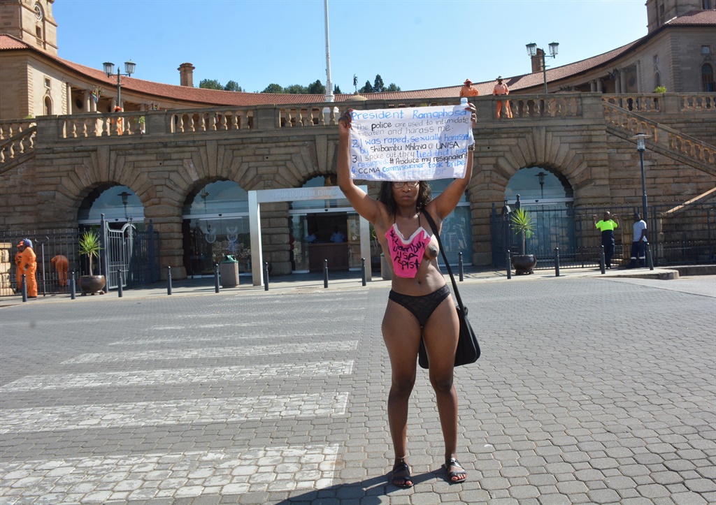 Gugu Ncube during her naked protest that led to her arrest at the Union Buildings in Pretoria. Photos by Morapedi Mashashe