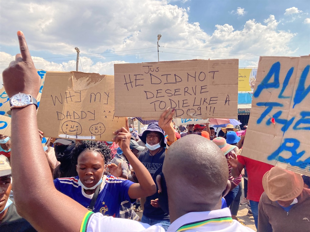 Community members protesting outside of Mamelodi East police station after Doctor Setlai was shot and killed by Tshwane metro police. 