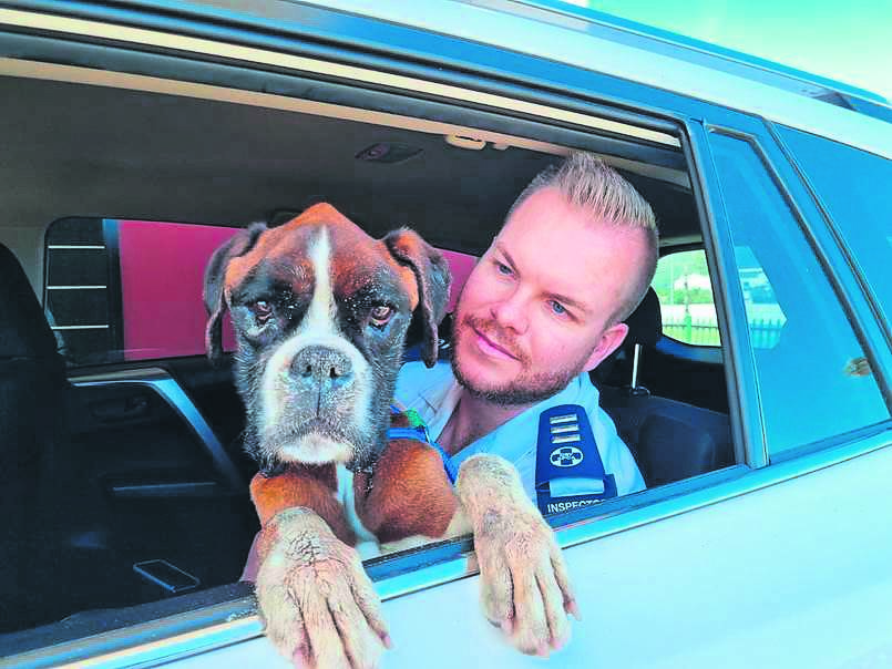 Chief Inspector Jaco Pieterse with adopted dog Rocky during his last days.