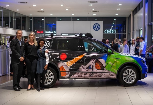 Primary Winner – Buchule Maseti (centre) with Martin Taverner (General Manager New Car Sales Tavcor Volkswagen) and Lisa Hundleby, Dealer Principal.