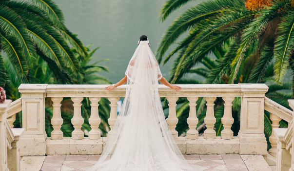 Rear View Of Bride Standing At Balcony. Photographed by 
Olga Shevtsova