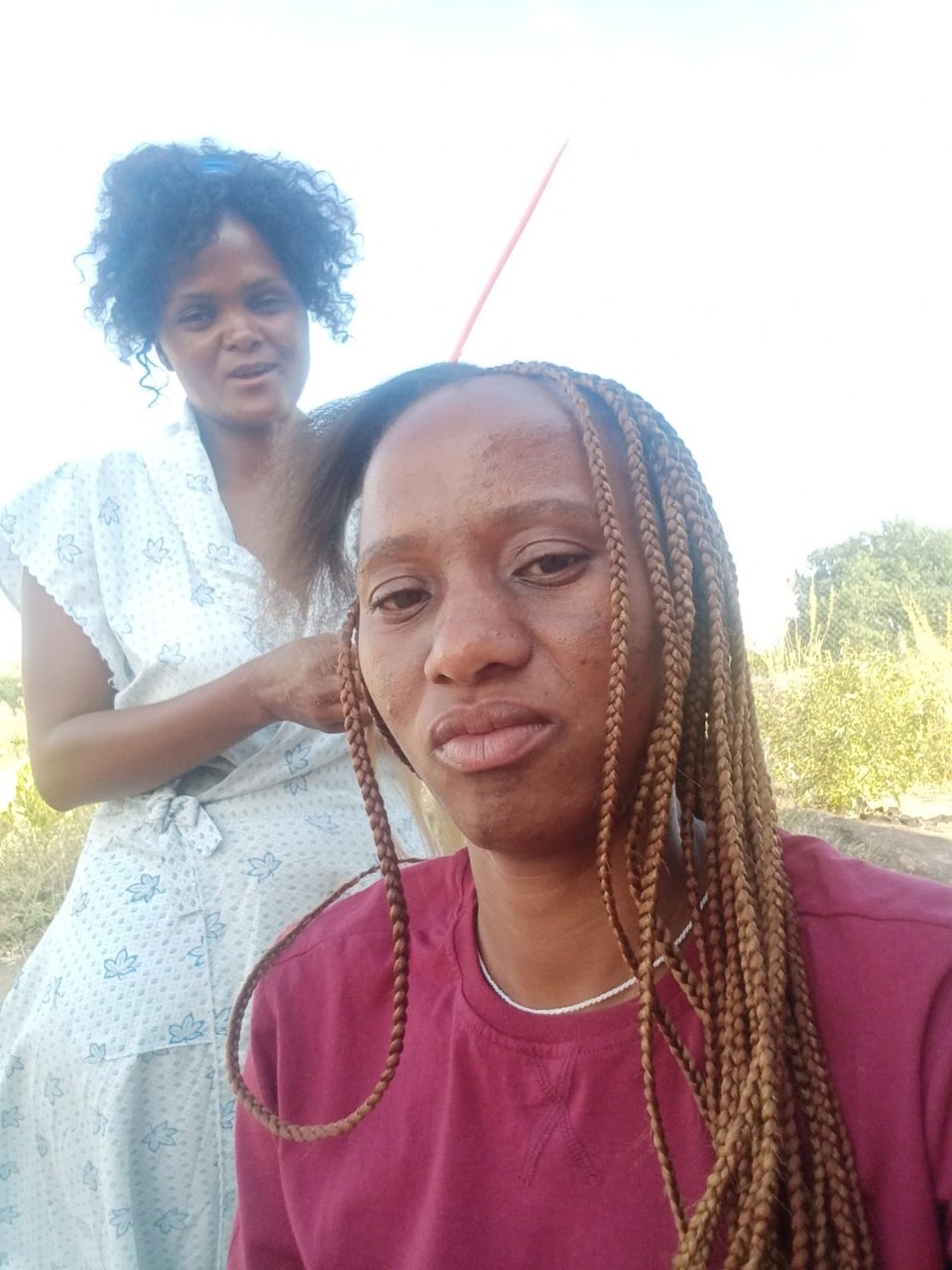 Hairdresser Victoria Makgoo with her client, Tshepiso Thobejane.