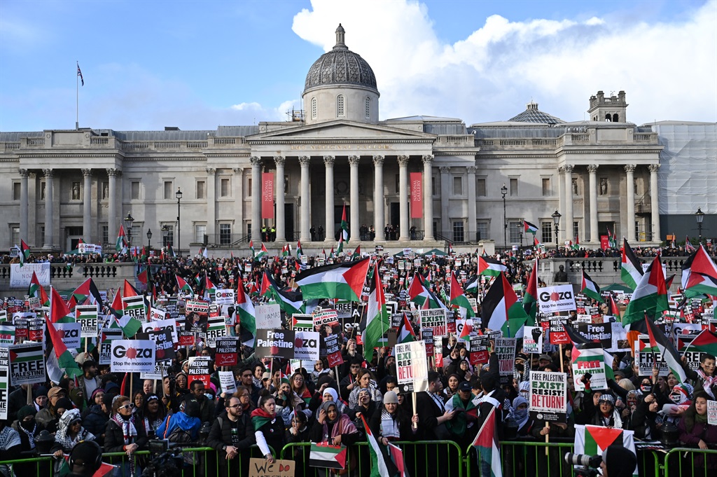 Protesters gather with placards and flags during the 'London Rally For Palestine' in Trafalgar Square, central London on 4 November 2023, calling for a ceasefire in the conflict between Israel and Hamas.