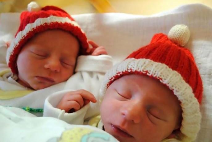 Twins Noel and Leon born in different decades at a German hospital 