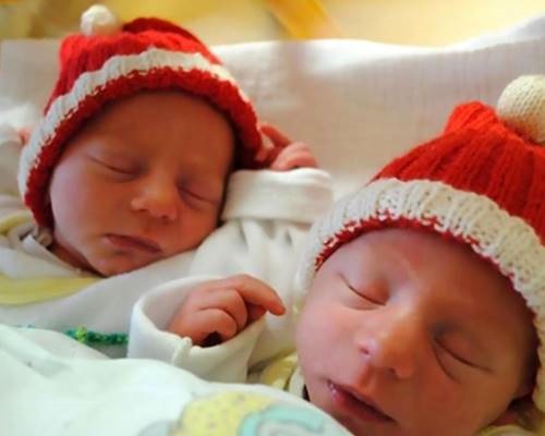Twins Noel and Leon born in different decades at a