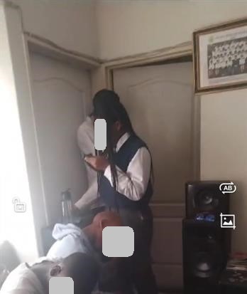 A screengrab from the video of pupils who were found in a house during school hours.