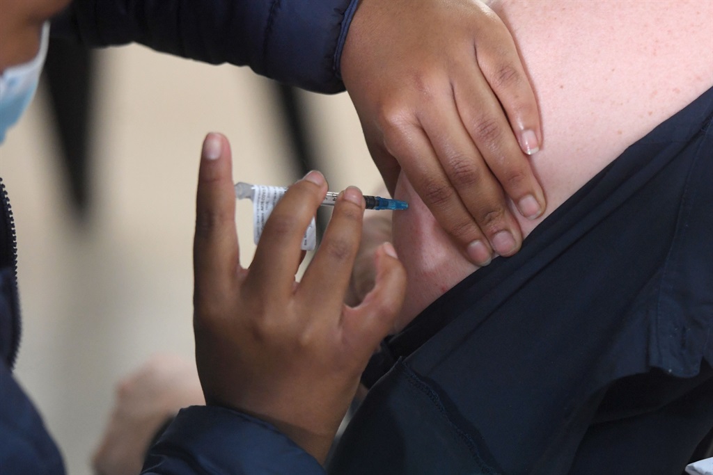 A medical staff receives the Covid-19 vaccine at the vaccination ward at Charlotte Maxeke Hospital in April. (Photo by Gallo Images/Beeld/Deaan Vivier)