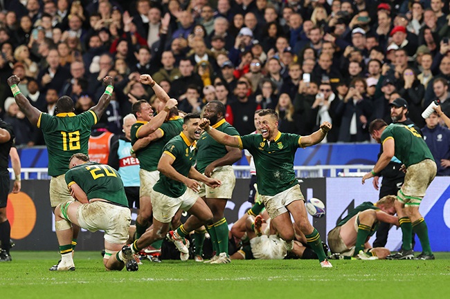 The Springboks celebrate after beating the All Blacks in the Rugby World Cup final. (Photo by David Rogers/Getty Images)