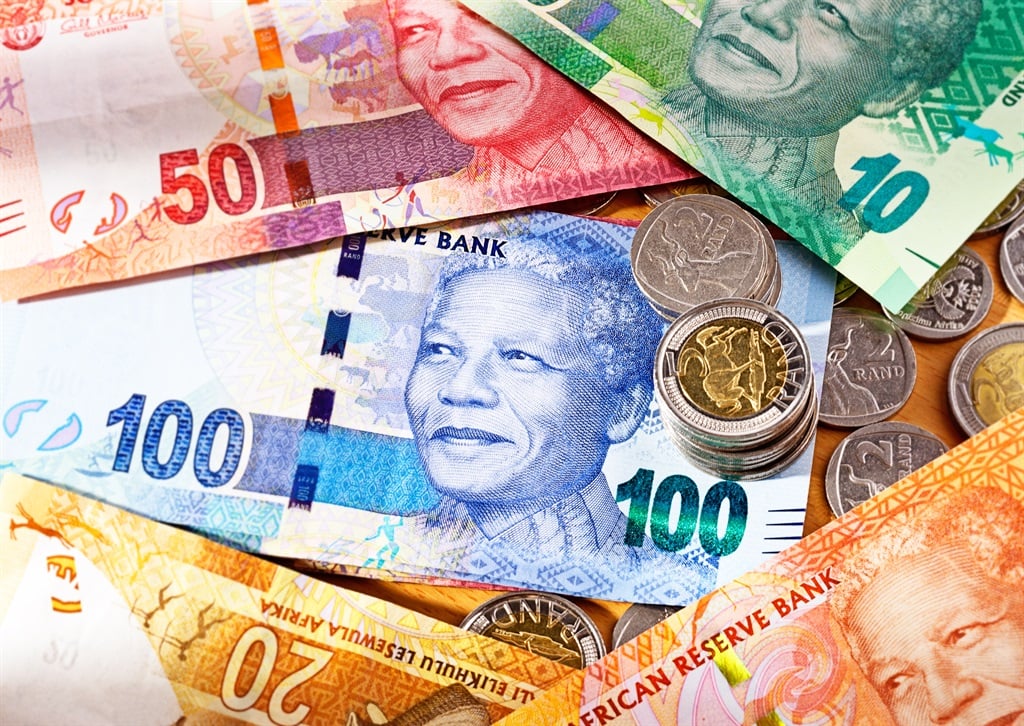 South African banknotes, featuring the smiling face of iconic statesman Nelson Mandela.