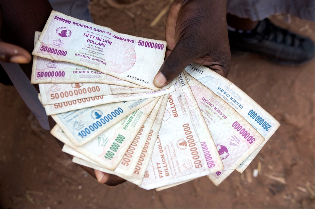 A moneychanger at the Chirundu border post between