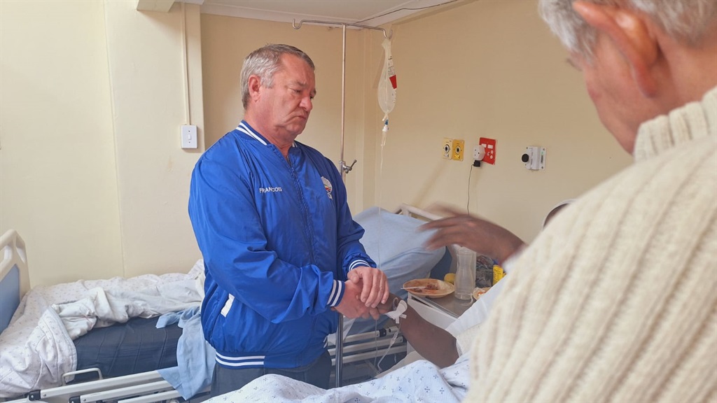 The DA KZN leader Francois Rodger visiting Councillor Michael Buthelezi in hospital. 