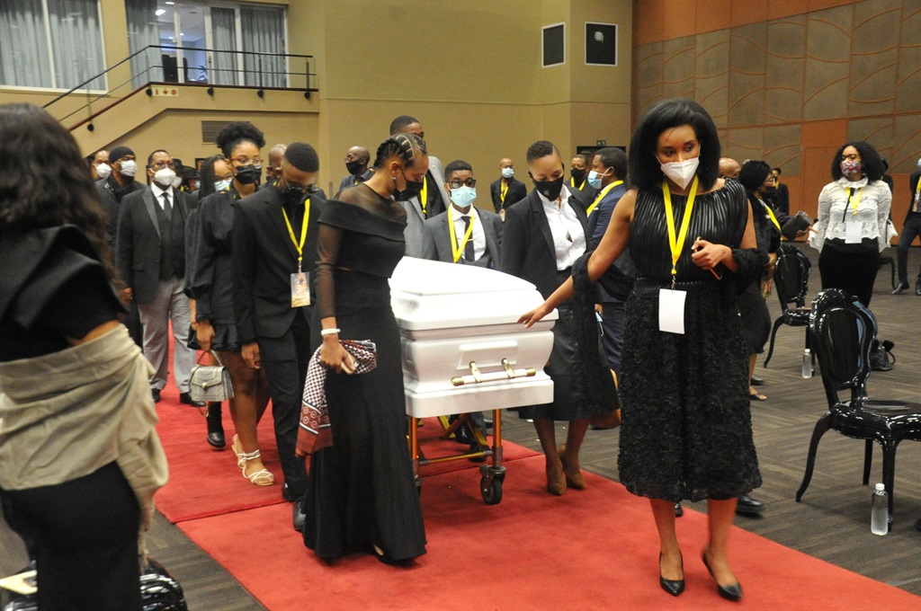 The Tembe siblings with the coffin. Photo: Jabulani Langa