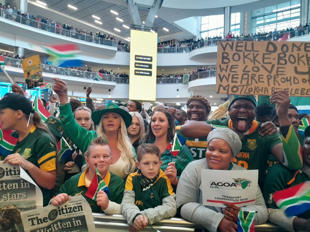 South Africans welcome the Springboks at OR Tambo International Airport. Photo by Happy Mnguni