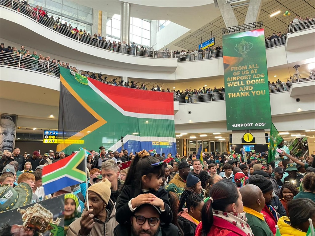 Springboks fans filled the arrival terminal at the