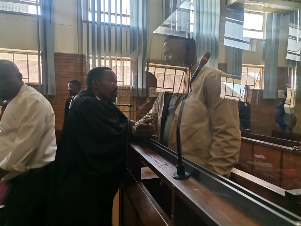 Abednigo Mbuyane with his lawyer, Zamokuhle Lukhele at the Nelspruit magistrate court. Photo by Bulelwa Ginindza 