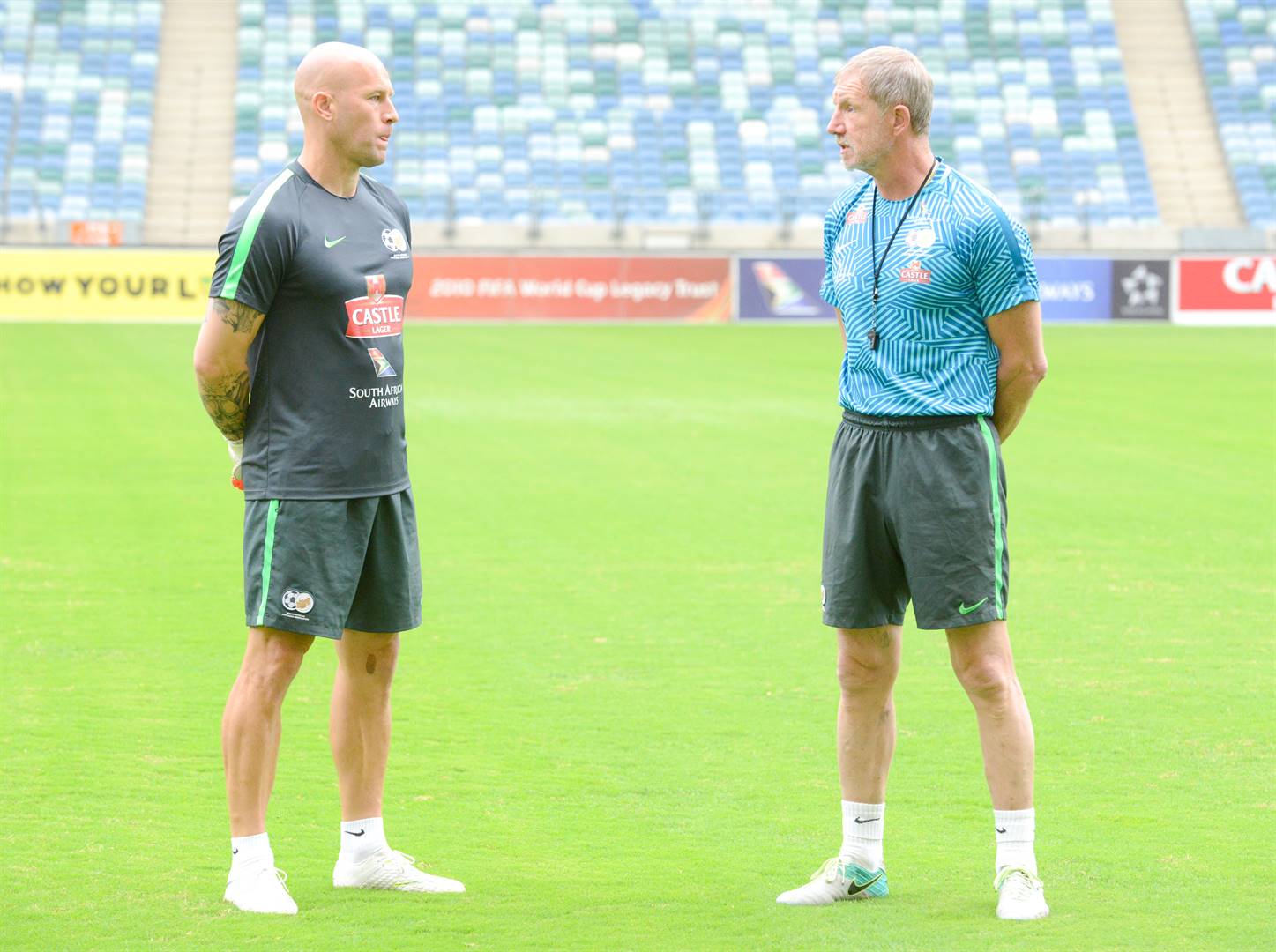 Lee Baxter has a chat to his father Stuart Baxter, who was at the time head coach of Bafana, during the South Africa training session at Moses Mabhida Stadium in September 2018. Picture: Gerhard Duraan/BackpagePix