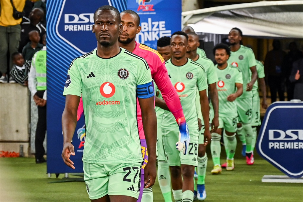 Tapelo Xoki, captain of Orlando Pirates leads his team out during the DStv Premiership match between AmaZulu FC and Orlando Pirates at Moses Mabhida Stadium on October 24, 2023 in Durban, South Africa. (Photo by Darren Stewart/Gallo Images)