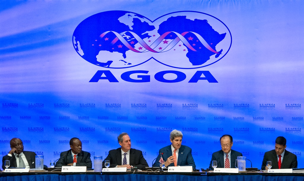 Former US Secretary of State John Kerry(C) addresses the African Growth and Opportunity Act( AGOA) 4 August 2014 during the US-Africa Summit at the World Bank in Washington, DC. 