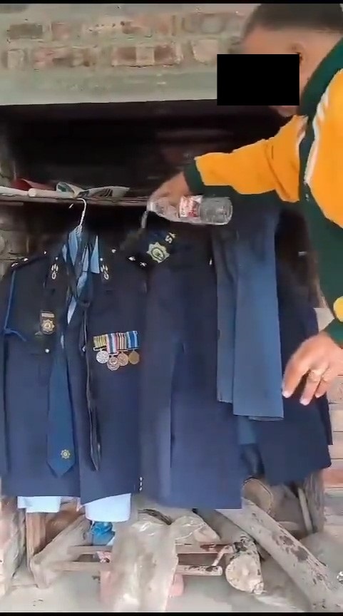 Screengrabs of a video where a police officer is s