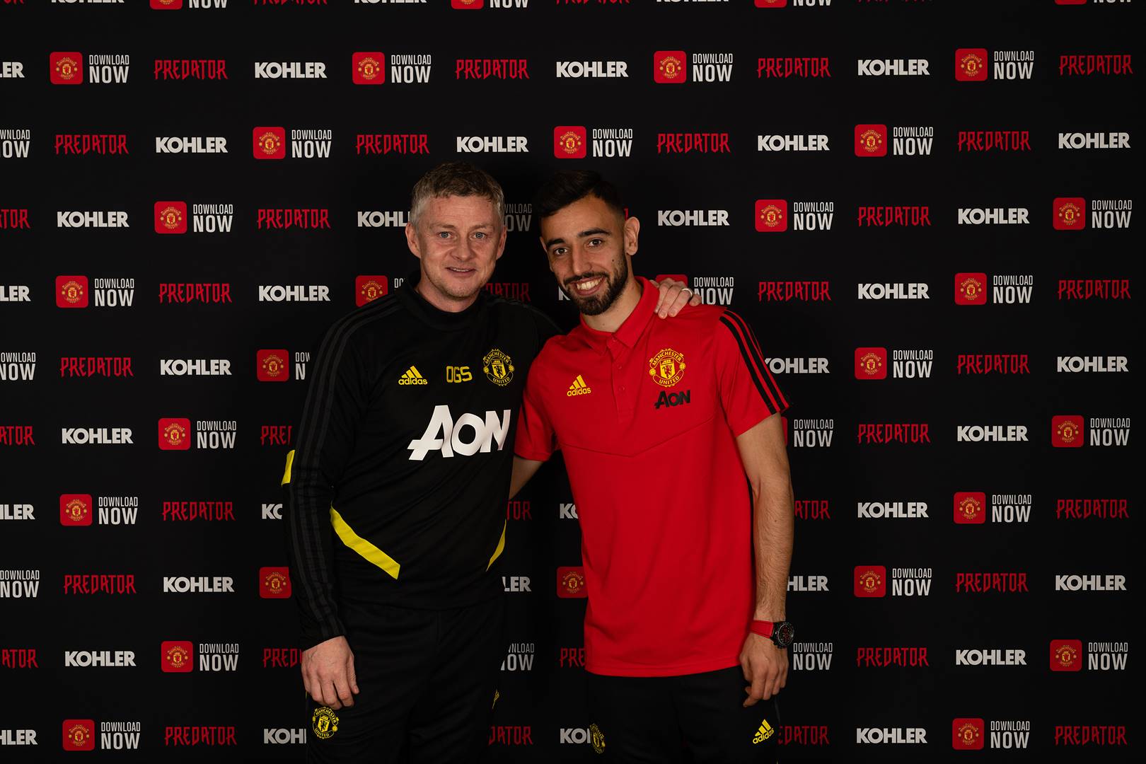 Bruno Fernandes of Manchester United poses with Manager Ole Gunnar Solskjaer after signing for the club at Aon Training Complex on January 30 2020. Picture: Manchester United/Manchester United via Getty Images)