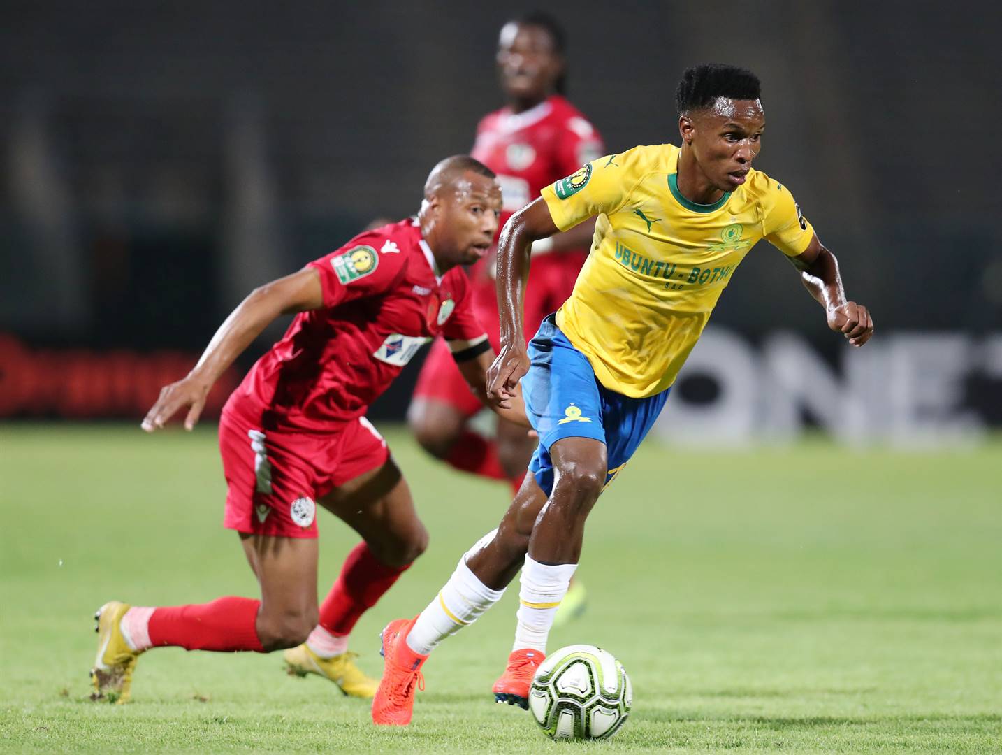 Themba Zwane of Mamelodi Sundowns is challenged by Brahim Nakach of Wydad during the 2019 TOTAL CAF Champions League match at the Lucas Moripe Stadium, Atteridgeville on January 19 2019 . Picture: Muzi Ntombela/BackpagePix