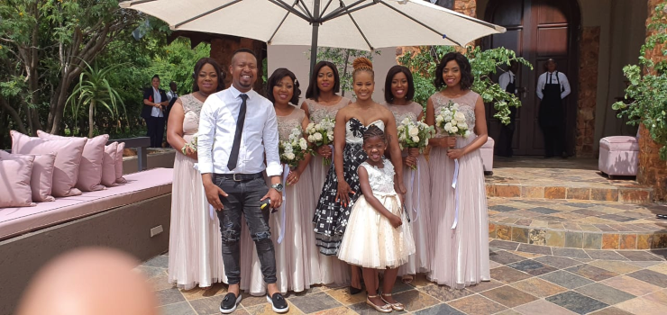 Moses Mkhatshwa, Tsholofelo Matshaba and the #KFCWedding bridesmaids. Image provided by Moses