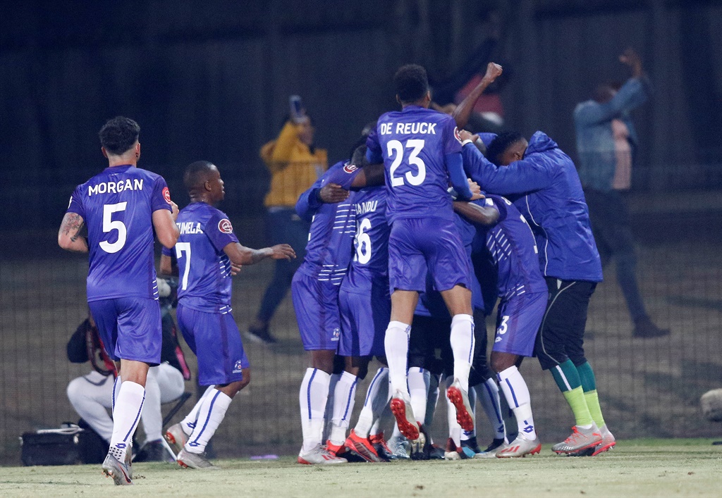 Maritzburg United players celebrate a goal.