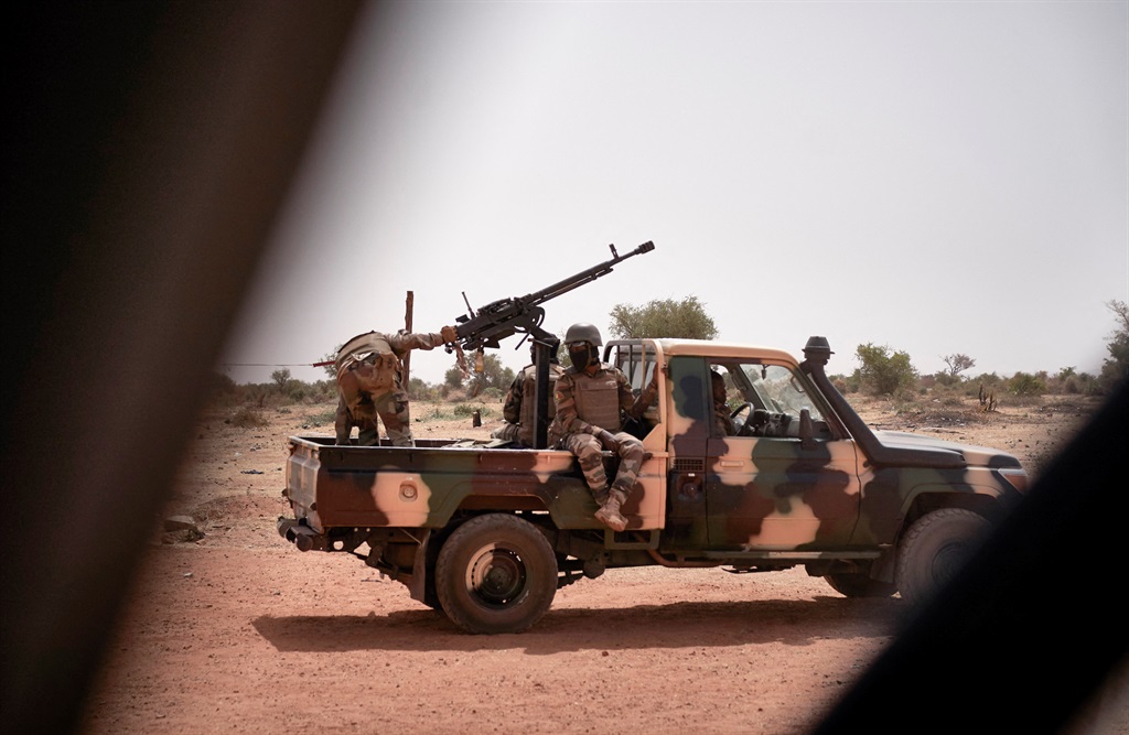 A Malian army patrol in 2021. (Photo by MICHELE CATTANI / AFP)