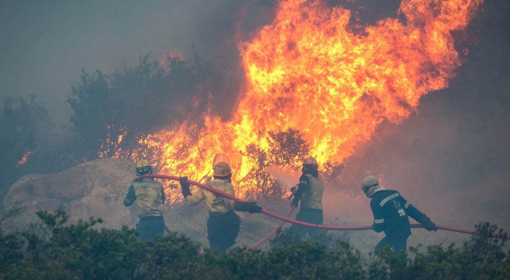 Firefighters battle a raging fire in  Vredehoek in gale force winds and heavy smoke on 19 April. 