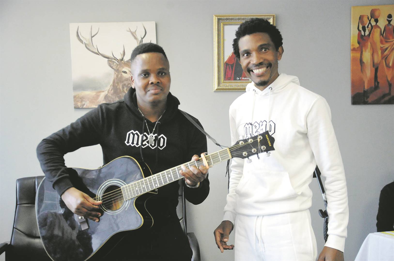 Maskandi star Khuzani Mpungose is with Dr Thobani Makhaza after the recording.        Photo by    Jabulani Langa