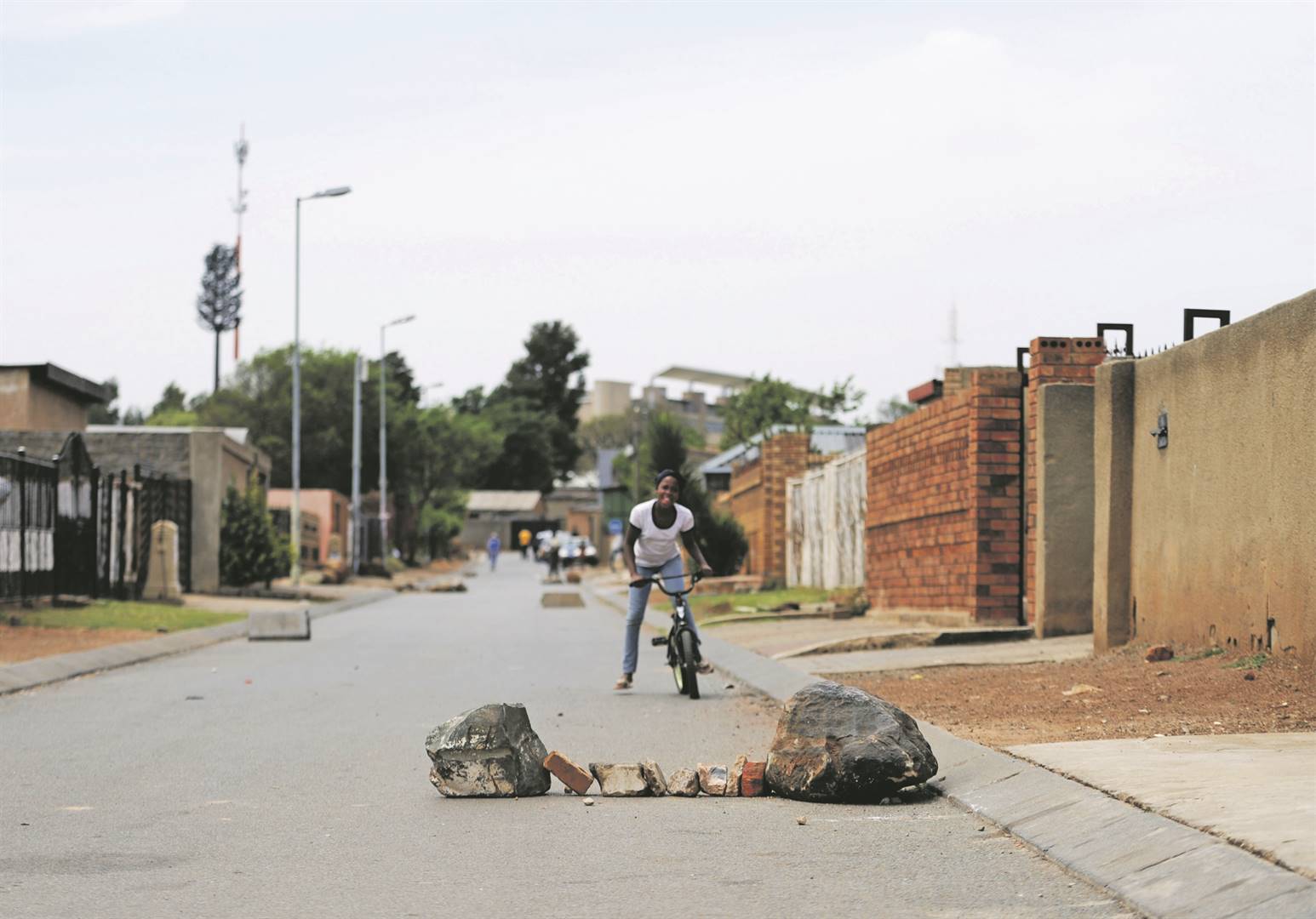 Makeshift speed humps in Soweto built by residents to stop cars from speeding. Photo: Tebogo Letsie