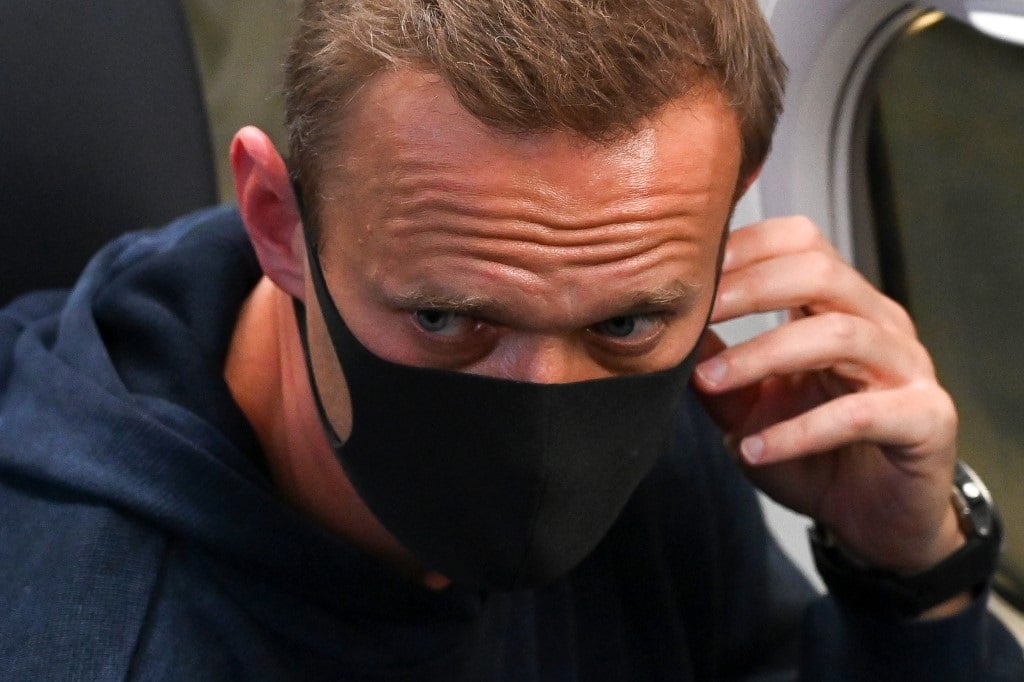 Russian opposition leader Alexei Navalny is seen in a Pobeda plane after it landed at Moscow's Sheremetyevo airport on January 17, 2021. (Kirill Kudryavtsev, AFP)